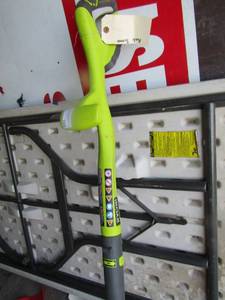 lot 104 image: Ryobi trimmer 18 volt, battery not included