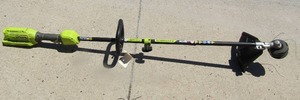 lot 173 image: Ryobi 40 volt weed eater with guard, needs battery- model # RY40006VNM, unknown working condition