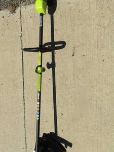 lot 174 image: Ryobi  40 volt trimmer model # RY40006VNM, needs battery, unknown working condition