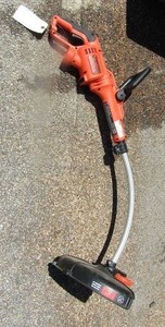 lot 182 image: Black  Decker 14in cut 120v electric curved string trimmer