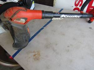 lot 184 image: Battery operated Black and decker grass hog weed eater