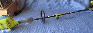 lot 195 image: Ryobi one 2 cycle full crank weed eater gas powered