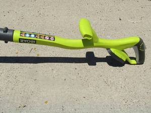 lot 158 image: Ryobi 18 volt cordless string trimmer, model# P2003VNM