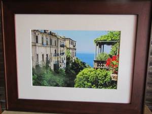 lot 15 image: Framed over sea wall art with vintage style living, balcony-- 2329 unknown artist