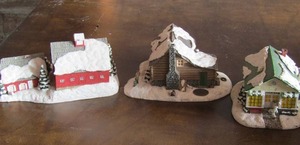 lot 24 image: The Norman Rockwell Gallery village houses x 3 the village bakery, woodsmans rest, and Christmas eve at the studio