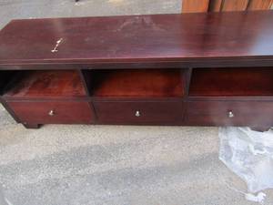 lot 60 image: Riverside furniture company Entertainment center with 3 bottom storage drawers, has a small gash on top easy fix, size-- 267220