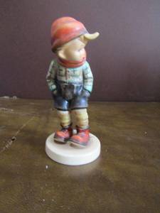 lot 45 image: Mj Hummel figurine March wind made in W. Germany