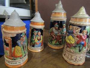 lot 50 image: Small medium and large west Germany Peter Pan Steins qty 3, 1 musical stein