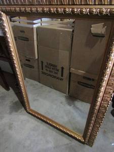 lot 52 image: Very nice heavy duty gold framed wall mirror in mint condition, size 4432