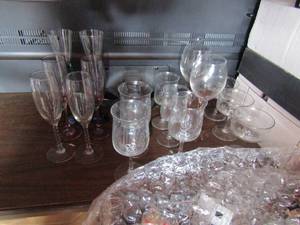 lot 109 image: Large lot of twisted stem wine glasses, pink glass wine glasses, various other champagne glasses
