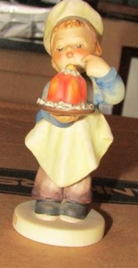 lot 112 image: Mj Hummel figurine from W. Germany- Baker boy