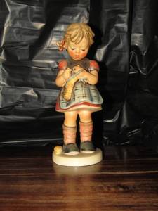 lot 115 image: Mj Hummel figurine from W. Germany- stitch in time