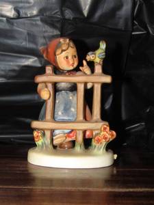 lot 117 image: Mj Hummel figurine from W. Germany- signs of spring