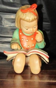 lot 119 image: Mj Hummel figurine from W. Germany- Book worm