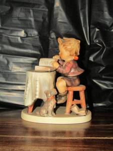 lot 120 image: Mj Hummel figurine from W. Germany- Little bookkeeper