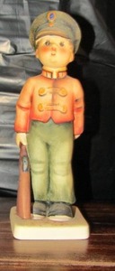 lot 121 image: Mj Hummel figurine from W. Germany- SoldIer Boy