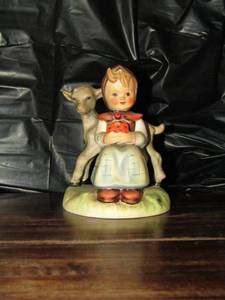 lot 123 image: Mj Hummel figurine from W. Germany- Good friends