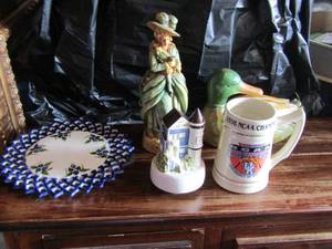 lot 132 image: I left my heart in San Francisco music dcor,  10 oval wall plate made in Maine,  Wooden duck, 11 lady statue for dcor