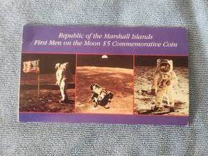 lot 53 image: First men on the Moon $5 commemorative coin