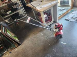 lot 51 image: Mantis rototiller - need prime bulb