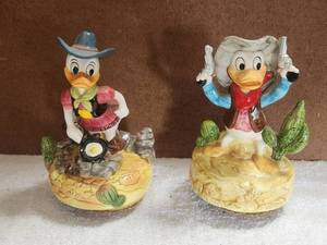 lot 25 image: Walt Disney Characters - Donald and Daisey duck music boxes