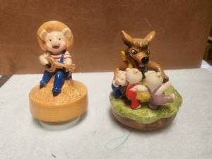 lot 102 image: Three little pigs and a country pig music boxes
