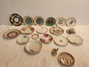 lot 224 image: Selection of collectible mini plates and suacers
