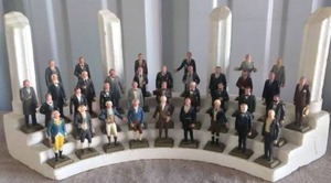 lot 41 image: Amazing Find---Complete set of Marx Presidential Figures with Display Stand