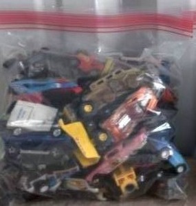 lot 53 image: Lot of 2 Bags Full of Die Cast Cars, planes, and trucks
