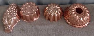 lot 60 image: Selection of 4 Copper Cake Molds