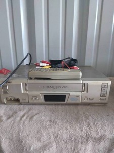lot 103 image: Sanyo VCR Model #VWM-700 with Remote and Cords