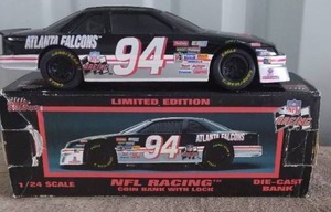 lot 120 image: NFL Racing Atlanta Falcons 124 Scale Die Cast Coin Bank with Key and Box