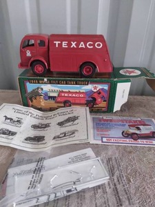 lot 123 image: Texaco 1949 White Tilt Cab Tank Truck comes with Mirrors and Accessories