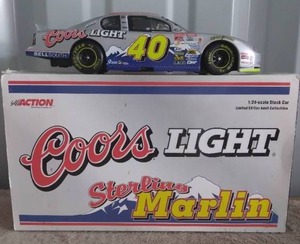 lot 127 image: Coors Light Sterling Marlin 124 Scale Die Cast Coin Bank with Box and Key