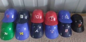 lot 131 image: Selection of 11 MLB Mini Helmets