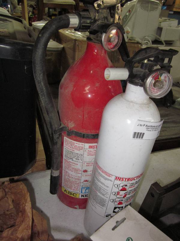 lot 70 image: Two fire extinguishers...
