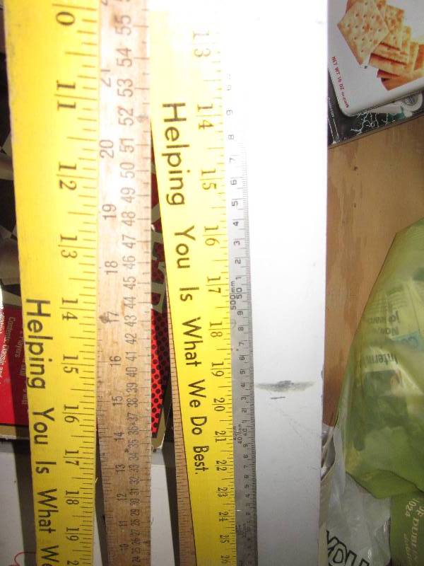 lot 98 image: 4 wooden yard sticks, 1 metal yard...