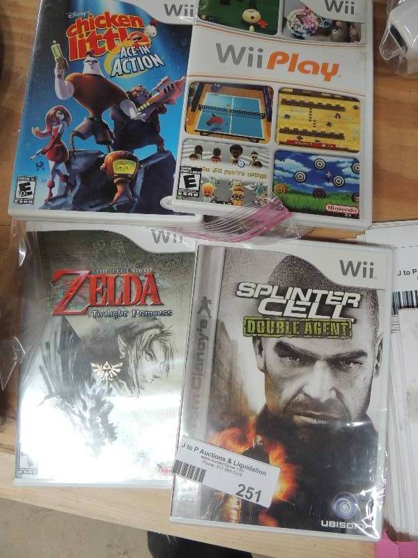 lot 251 image: 4 Wii games - Splinter Cell CHICKEN LITTLE, WII PLAY and more