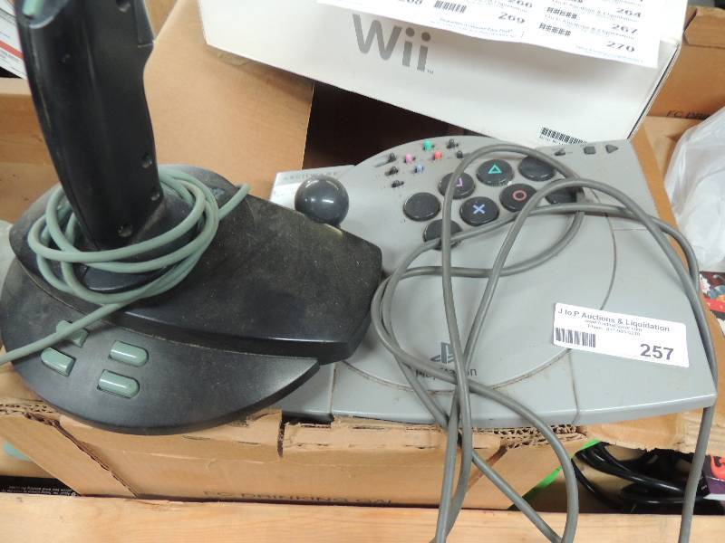 lot 257 image: Platstation game control...