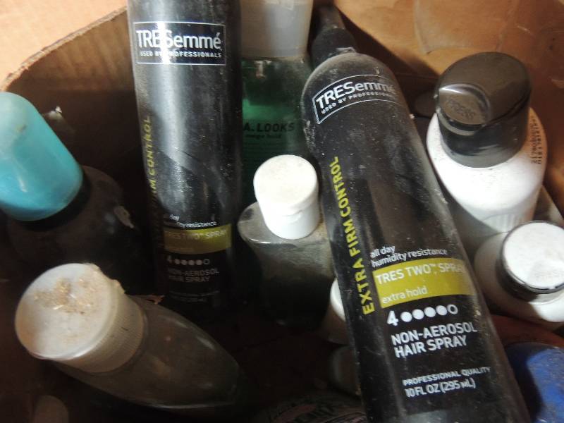 lot 190 image: Box of opened shampoo. Sun screen ...
