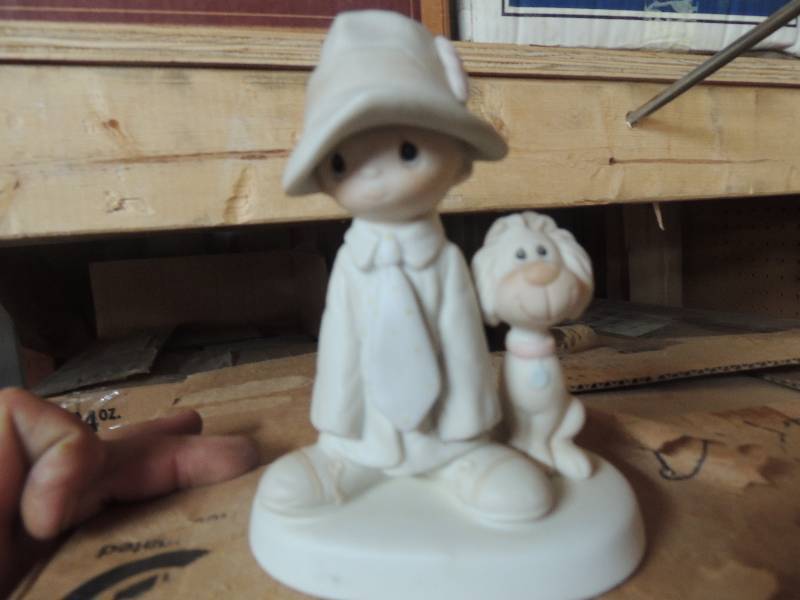 lot 200 image: Porcelain boy and dog by Jonathon D...
