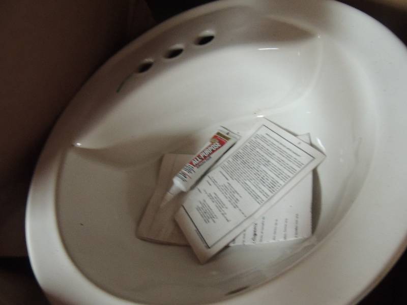 lot 203 image: NEW ceramic bathroom sink...