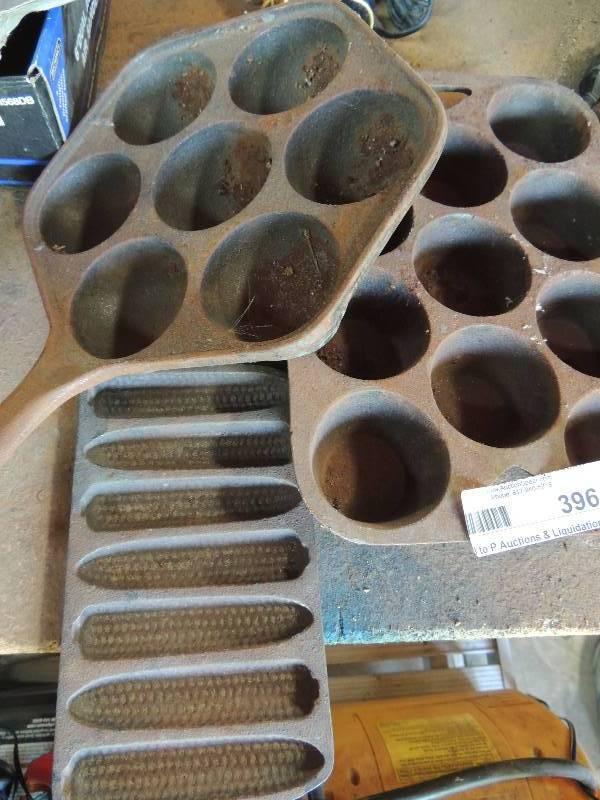 lot 396 image: cast iron muffin pans...