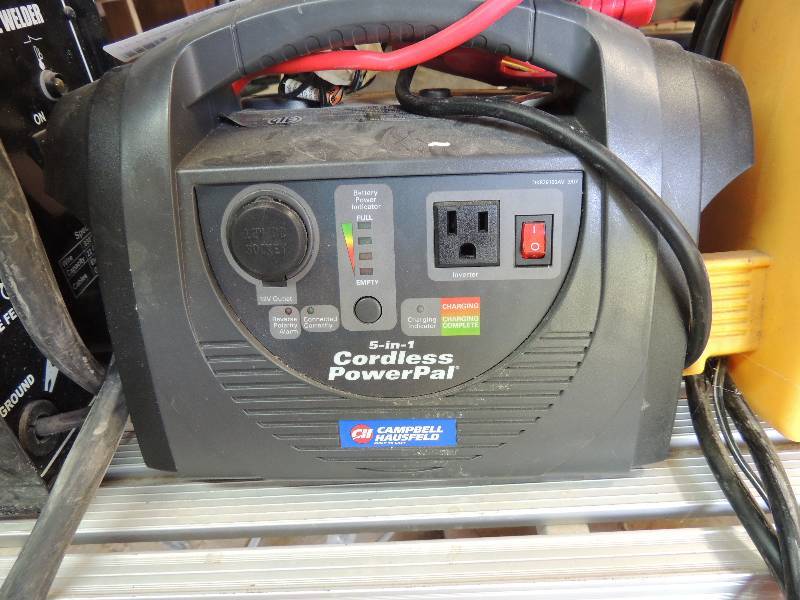 lot 403 image: Combell household battery charger...
