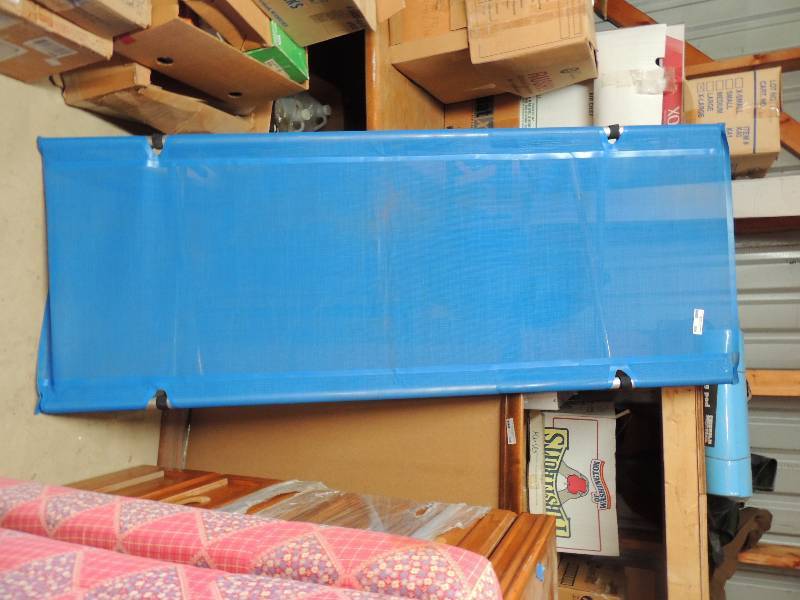 lot 506 image: Blue Cot comes apart for storage...
