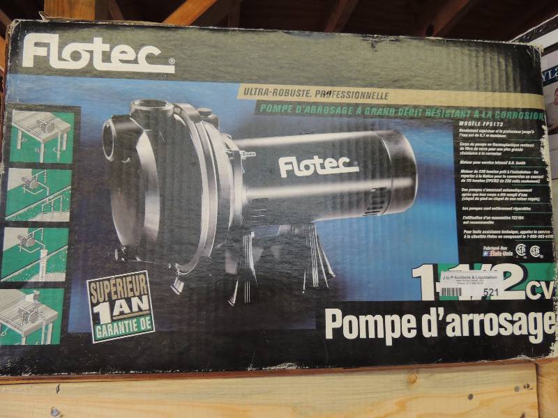 lot 521 image: Flotec water pump in box...