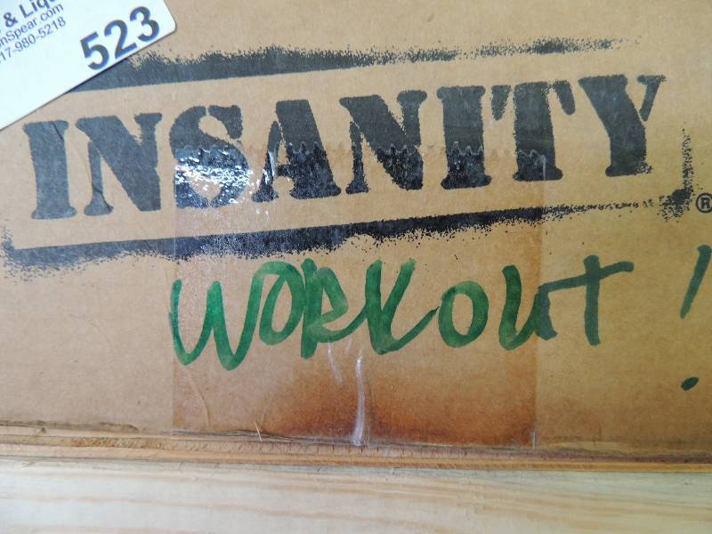 lot 523 image: Beach body insanity work out...