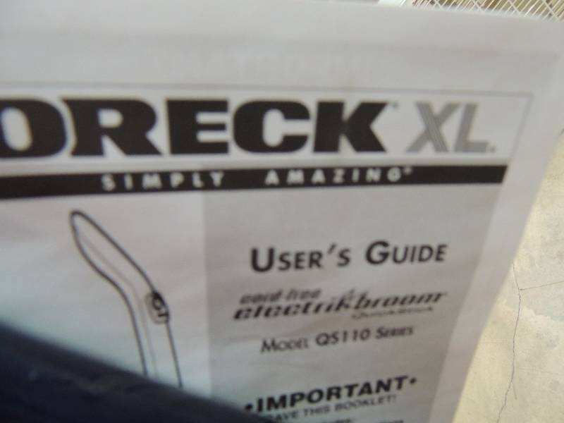 lot 630 image: ORECK ELECTRIC BROOM W BOOK...