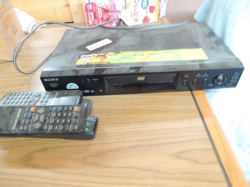 lot 649 image: SONY DVD PLAYER W 4 REMOTES