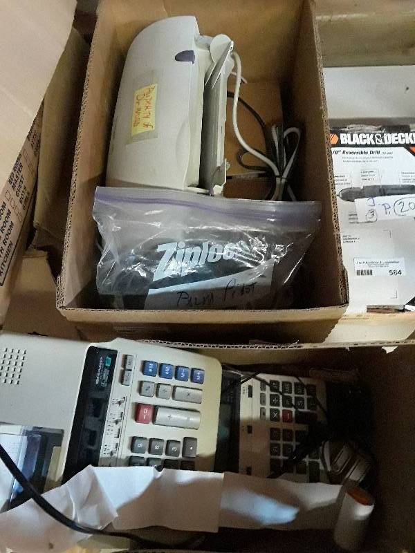 lot 566 image: palm pilot and FAX machine...